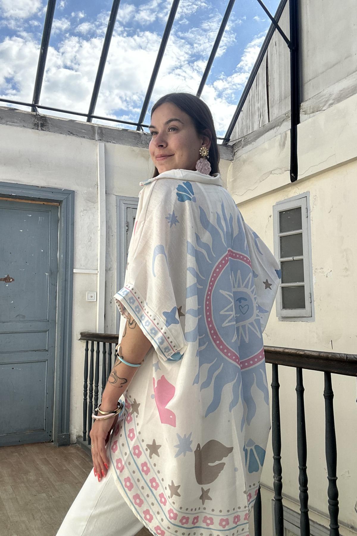 Tunique taille unique art 45113 avec soleil dans le dos 